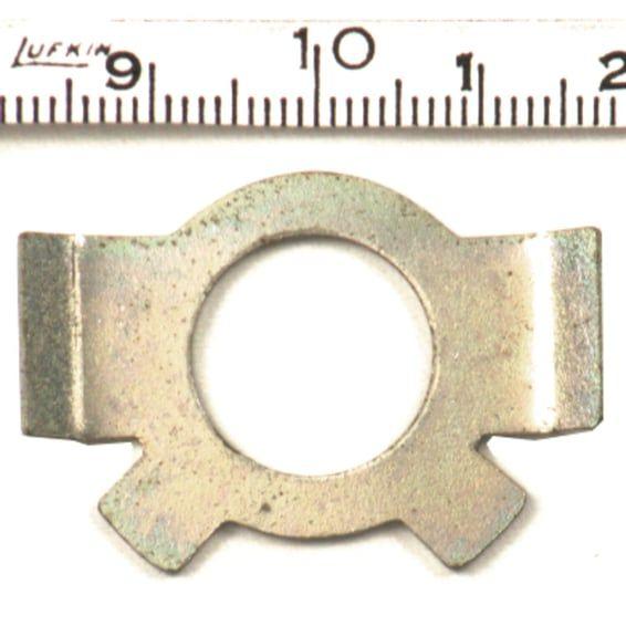 Lock tab, shifter cam follower retainer