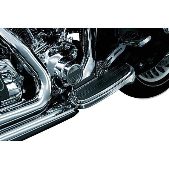 Floorboard exhaust boot guard