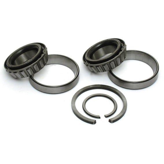 Sprocket shaft bearing assembly